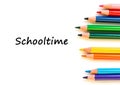 Color pencils isolated on white background. Text schooltime.