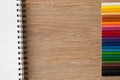 Color pencils with notebook Royalty Free Stock Photo