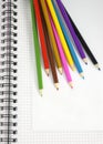 Color pencils and notepad Royalty Free Stock Photo