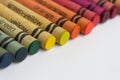Color pencils / old wax crayons on white paper Royalty Free Stock Photo