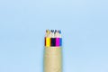 Color pencils in pencil case on blue background top view flat lay with copy space. Wooden colored pencils for drawing, objects for Royalty Free Stock Photo