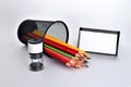 Color pencils, pencil sharpener, card holder Royalty Free Stock Photo