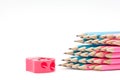 Color pencils and pencil sharpener Royalty Free Stock Photo