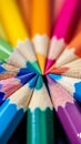 Color pencils pile in close up macro shot, wooden desk Royalty Free Stock Photo