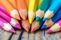 Color pencils pile in close up macro shot, wooden desk Royalty Free Stock Photo