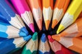 Color pencils pile in close up macro shot, wooden desk Royalty Free Stock Photo
