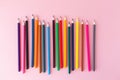 Color pencils on pink background close up with Clipping path..Color pencils for drawing Rainbow. Copypaste, flat lay