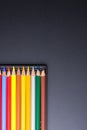 Color Pencils with plastic case isolated on Black Background clo Royalty Free Stock Photo