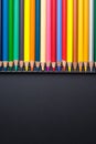 Color Pencils with plastic case isolated on Black Background clo Royalty Free Stock Photo