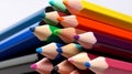 color pencils on a pristine white backdrop.