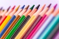 Color pencils on purple background, close-up Royalty Free Stock Photo