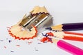 Color pencils, sharpener and shavings isolated on a white background Royalty Free Stock Photo