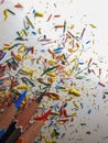 Color pencils and shavings on white background, top view Royalty Free Stock Photo