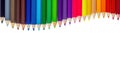 Color pencils wave on white background Royalty Free Stock Photo