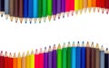 Color pencils wave on white background Royalty Free Stock Photo