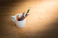 Color pencils in white coffee cup Royalty Free Stock Photo