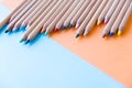Color pencils, on colored paper. Top view, flat lay. Close up on a white background. copy space for text Royalty Free Stock Photo