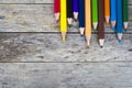 Color pencils on wood plank Royalty Free Stock Photo