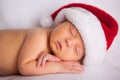 Christmas Newborn Baby Wearing Santa Hat and Sleeping Royalty Free Stock Photo