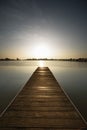 Color photography, pier at sunrise in a park of Manresa