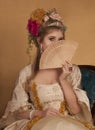 Color  portrait of beautiful woman dressed in rococo 1700s fashion Royalty Free Stock Photo