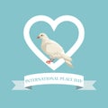 Color poster pigeon in heart shape frame with label international peace day text