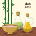 Color poster of spa center with bamboo plant and bowl and oil essences bottles