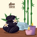 Color poster of spa center with black stones and bamboo plant and candles and towels Royalty Free Stock Photo