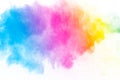 Abstract multi color powder explosion on white background. Freeze motion of dust particles splashing. Painted Holi in festival Royalty Free Stock Photo
