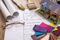 Color sampler with house plan and drawing tools Royalty Free Stock Photo