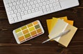 Color samples cmyk on black keyboard Royalty Free Stock Photo