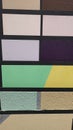 Color samples of decorative plasters at the store Royalty Free Stock Photo