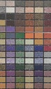 Color samples of decorative plasters at the store Royalty Free Stock Photo