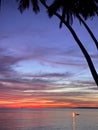 The color of the sky at dusk on the beach is decorated with palm trees / coconut trees Royalty Free Stock Photo