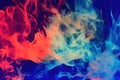 color smoke abstract background cold hot ice fire flame defocused blue red contrast paint splash Royalty Free Stock Photo