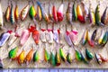 Color spoon baits, tackles and wobblers. Fishing lures and accessories Royalty Free Stock Photo