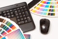 Color swatches and computer keyboard, mouse Royalty Free Stock Photo