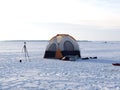 Color tent on iced lake