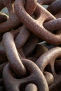 Graphic detail shot of a rusty anchor chain. Royalty Free Stock Photo