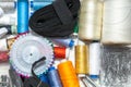 Color threads and sewing accessories on white background close-up Royalty Free Stock Photo