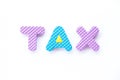 Color toy foam alphabet in word tax on white background Royalty Free Stock Photo