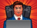 Color vector pop art style illustration of an angry man sitting in an office chair at a table. Boss is sitting in front of a lapto