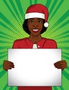 Color vector pop art style illustration. Business woman holding a blank poster. African-American woman wearing a Santa Claus hat o Royalty Free Stock Photo