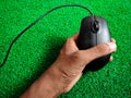 Color wired computer mouse. Isolated on green background Royalty Free Stock Photo