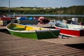 Color Wooden Boats with Paddles in a Lake Royalty Free Stock Photo