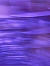 Color of the year 2022 Very Peri blue hue violet bright bokeh background