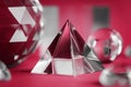 Color of the year 2023 Viva magenta. Crystal prism refracting light, magic crystals and pyramid, sphere and cube on Royalty Free Stock Photo