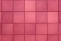Color of year 2023 Viva Magenta. Image with aged square tiles are toned in pantone color of viva magenta. New Fashion colour. Clay