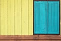 Color yellow blue orange wooden wall and window. Royalty Free Stock Photo