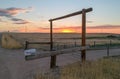 Colorado Country Gate Next to Dirt Road Sunset Royalty Free Stock Photo